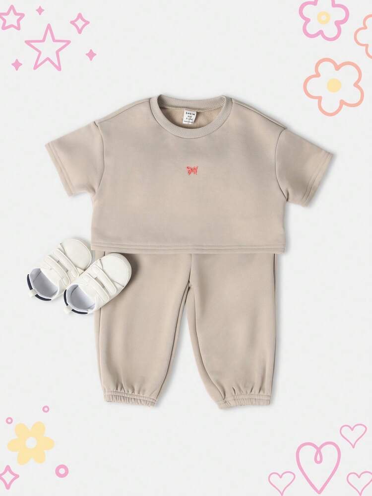 Bluza z logo motyla i elastycznymi spodniami typu jogger