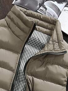 Manfinity Homme 2025 Chaqueta de hombre para otoño e invierno, chaqueta sin mangas casual de unicolor para hombre, chaleco de otoño/invierno, el chaleco de la chaqueta acolchada de hombre está engrosado