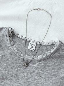 قميص تريكو بنات المراهقات بلون أحادي بطراز BM، رقبة دائرية، بلوزة بفيونكة وتصميم تباين اللون، مطرز على الخصر، تصميم مجمع، أكمام طويلة، ملابس صيفية أساسية وكاجوال