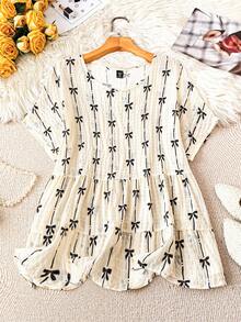SHEIN LUNE Blusa de cuello redondo con textura, manga corta y estampado de moños para tallas grandes - Albaricoque - Ver 2