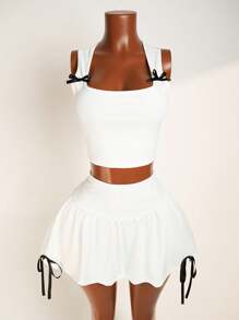 Zolique مجموعة قميص بدون أكمام بزخرفة القوس للنساء وتنورة قصيرة للغاية للصيف، 2 قطعة - أبيض - مشاهدة 7