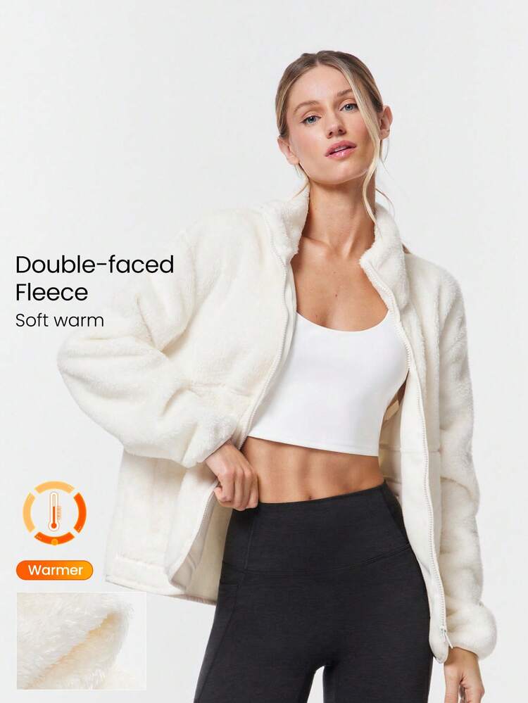 フリース 柔らかい 暖かい 防風 カーブカラー裾デザイン ヒップ丈 ジップアップジャケット サイドポケット付き デイリーカジュアルウェア 秋冬