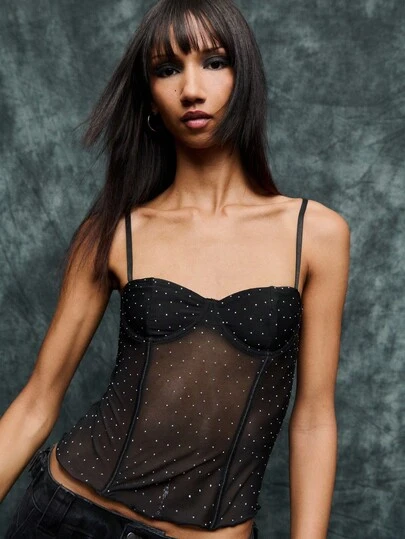 TypaGal Sheer Dotted Mesh Corset Top Is The Ultimate Blend Of Alt And Goth, Great For Fall Women Clothes And Halloween. Style With Wide Leg Pants Or Under Jackets For The Corset Tops For Women . A Chic Choice For Both Halloween Costumes Or Winter Clothes For Women Seeking A Bold Look.