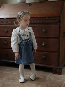 Vintaside Kids Bebé niña Bebé/Niña pequeña Blusa de manga larga con cuello bordado de otoño emparejada con falda de peto de mezclilla lavada a la moda, adecuada para salidas en clima suave de otoño, campamentos, vacaciones, reuniones familiares y uso casual diario