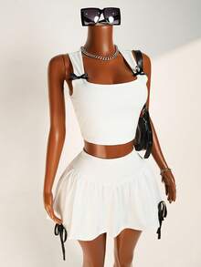 Zolique مجموعة قميص بدون أكمام بزخرفة القوس للنساء وتنورة قصيرة للغاية للصيف، 2 قطعة - أبيض - مشاهدة 6