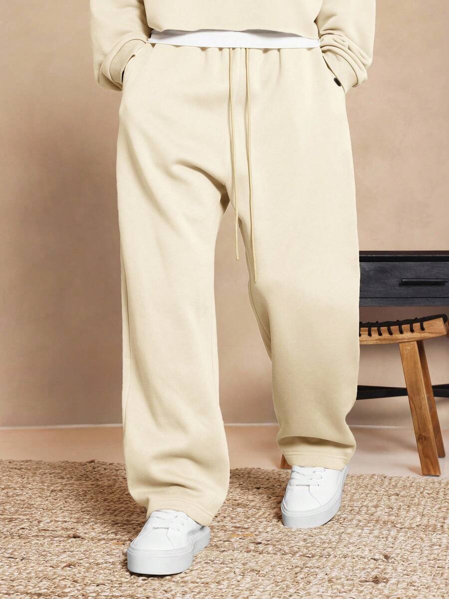 SUMWON Essential 低裆慢跑裤 宽松版型 抽绳腰带 休闲居家服 舒适宽松阔腿运动裤 秋冬纯色 - 米色 - 查看 1