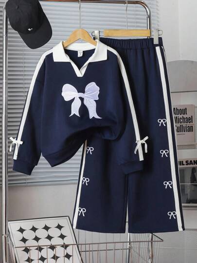 Genkimix Kids مجموعة بلوزة كنزة رياضية بياقة على شكل حرف V مطرزة بفيونكة وبنطلون مستقيم الساق مع شريط جانبي مطابق، إطلالة كاجوال للخريف/الشتاء