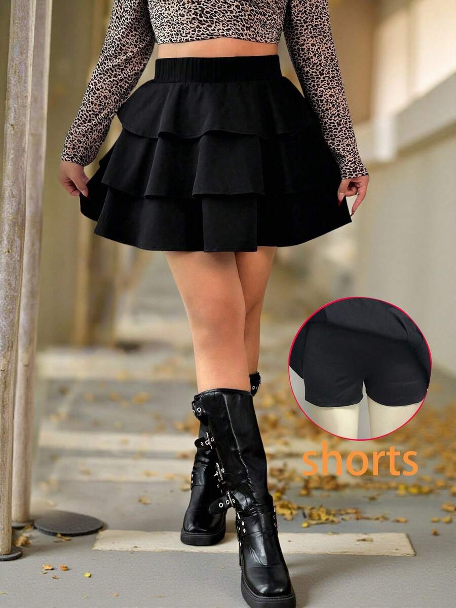 Emery Rose Kids Emery Rose Kids Váy xòe màu trơn phong cách Halloween thường ngày cho bé gái, phối đồ dạo phố, tối giản, thể thao, học viện, phù hợp với mọi mùa (xuân, hạ, thu, đông), mặc ở nhà, tập thể dục ngoài trời, đi học, giải trí hàng ngày. Cùng phong cách với mẹ tôi, cùng phong cách với chị gái và em trai tôi. Váy đen cho bé gái, váy đen xếp nếp nhiều tầng màu đen, váy xòe đen cho bé gái, váy đen trẻ em, váy ngắn màu đen kèm quần short, dài đến đầu gối, váy đen thu đông - màu đen - Xem 1