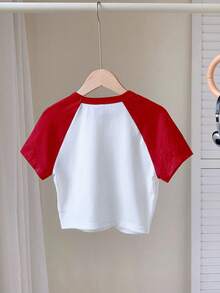 Attitoon Áo thun tay ngắn Raglan cổ tròn ôm sát màu đỏ và trắng, họa tiết nơ đỏ - Đỏ và trắng - Xem 2