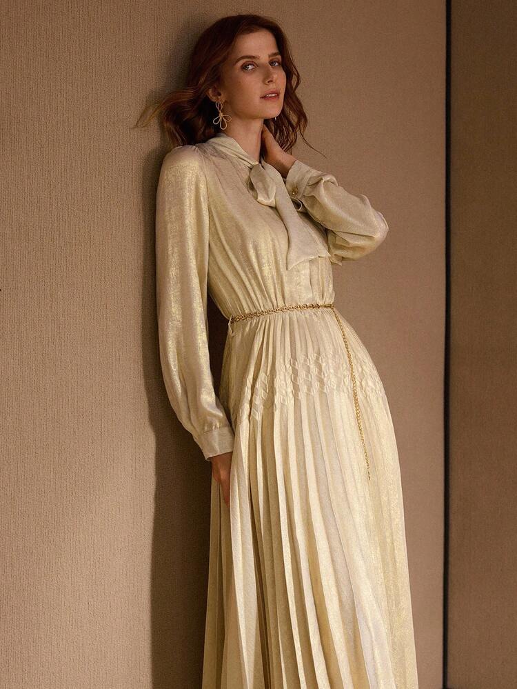 TIE NECK LANTERN SLEEVE PLEATED DRESS WITH CHAIN BELT