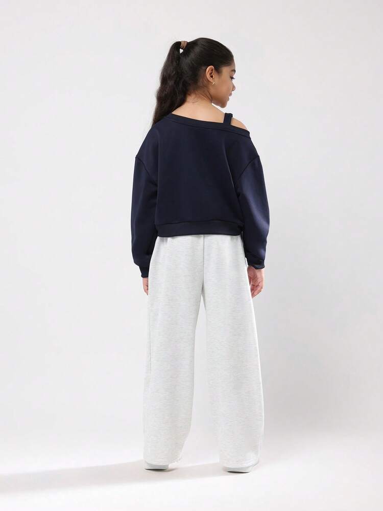 Bluza z odkrytymi ramionami i szerokimi nogawkami