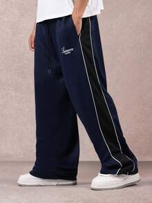 SUMWON 阔腿运动裤街头休闲侧条纹宽松抽绳腰部舒适下装日常弹力踝部秋冬经典款式 - 藏蓝色 - 查看 1