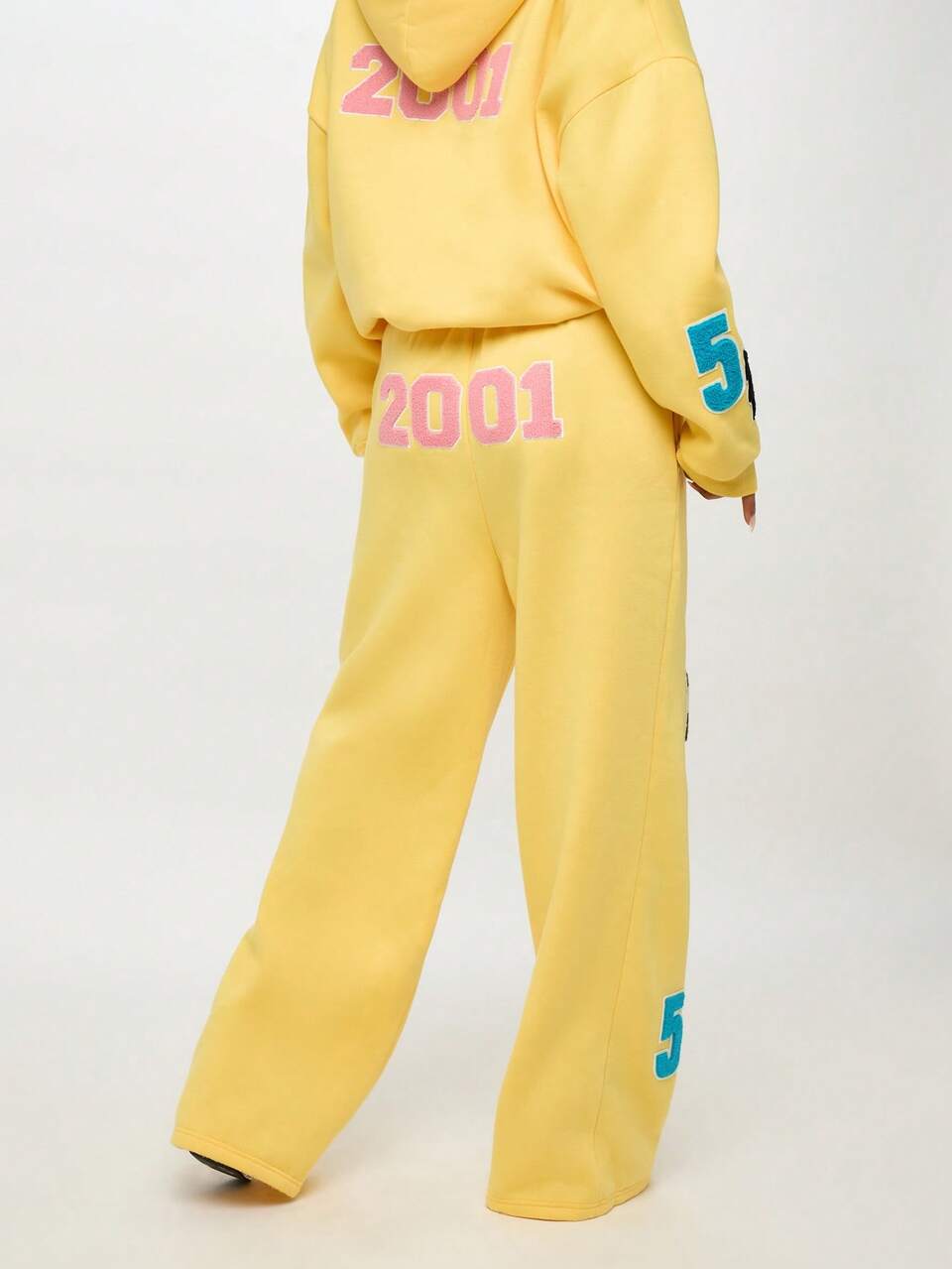 SUMWON WOMEN Pantaloni della tuta con stemma universitario, dettagli toppa e coulisse in vita