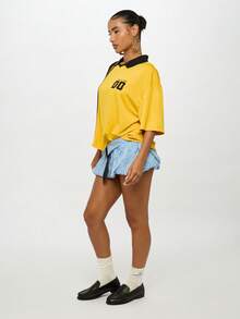 SUMWON WOMEN Boxy Varsity Style Collared Polo Top With Diagonal Stripe Detail And Number Print Half Sleeve Drop Shoulder Casual Preppy Oversize Tshirt - Yellow - View 6