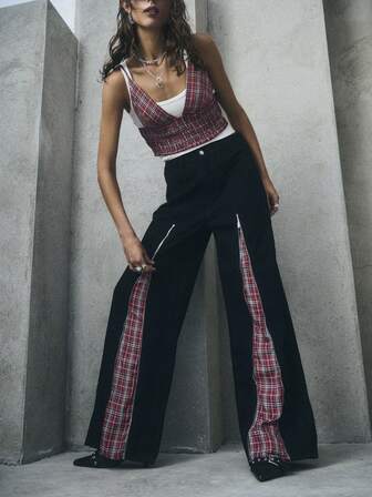 TypaGal These Black Wide Leg Pants With Plaid Zip Inserts Fuse Goth, Alternative (Alt), And Y2k Vibes For Standout Fall Clothes For Women And Winter Clothes For Women. The Zip Details Allow You To Adjust The Look-Keep The Zips Open To Reveal The Statement Plaid Panels For Added Edge, Or Close The Zips For A Classic Black Wide Leg Trousers Women Silhouette.