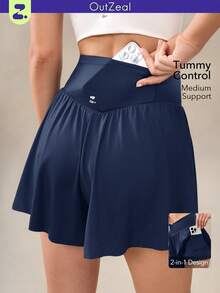 OutZeal Pantalones cortos deportivos para mujer con control de abdomen, absorción de sudor, cintura cruzada, con bolsillo incorporado, para tenis, gimnasio y entrenamiento - Azul - Ver 1