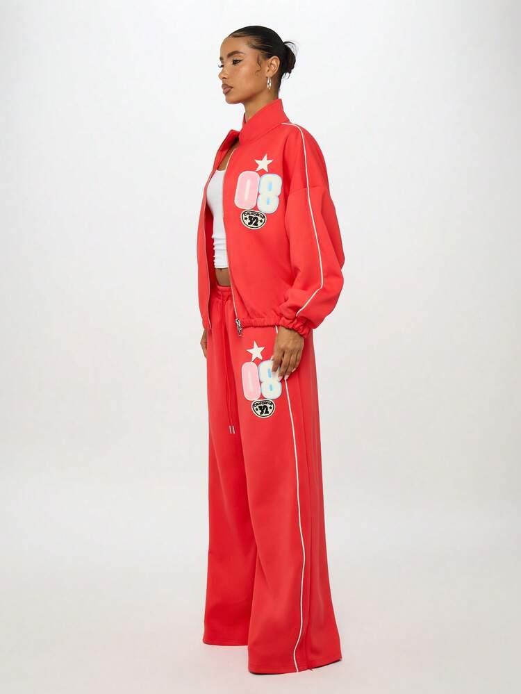 SUMWON WOMEN Pantalones deportivos de pierna ancha con insignias universitarias y ribetes