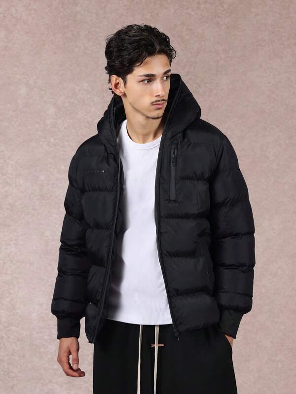 SUMWON Chaqueta acolchada de invierno con capucha y estilo bomber, con bolsillos con cremallera, puños acanalados y aislamiento de alternativa de plumón para clima frío