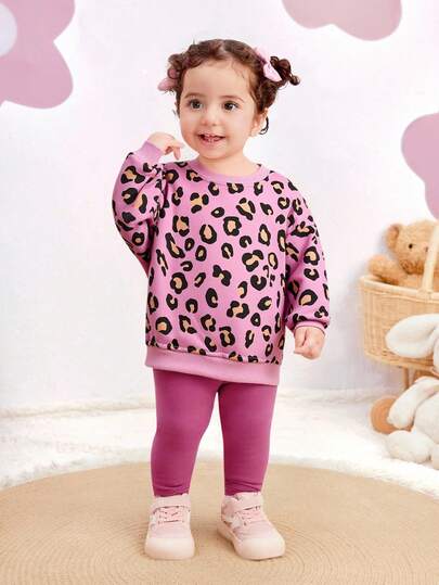 SHEIN Conjunto de 2 piezas de sudadera informal de punto con estampado de leopardo y pantalones rosas de cintura elástica para bebé niña, otoño/invierno
