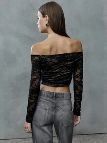 TypaGal Sheer Black Lace And An Off-Shoulder Neckline Create This Flirty Crop Top. Channel Punk Or 2000s Vibes By Pairing It With Distressed Denim Or A Mini Skirt For A Bold Night-Out Look. - Black - View 2