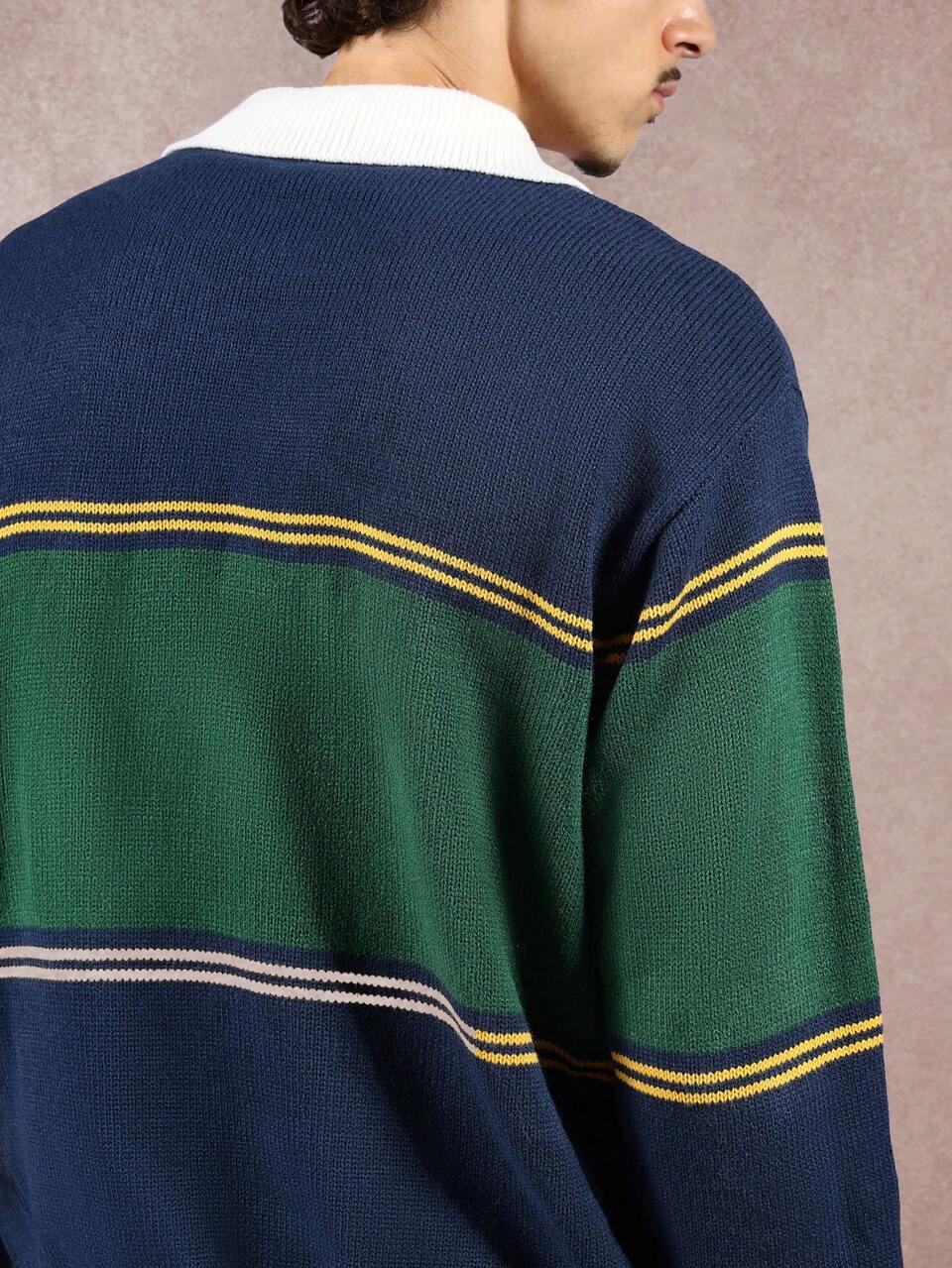 Suéter polo de malha com blocos de cores e gola contrastante