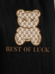 女孩休闲可爱卡通熊和字母图案印花短袖 T 恤和紧身裤两件套，适合返校装