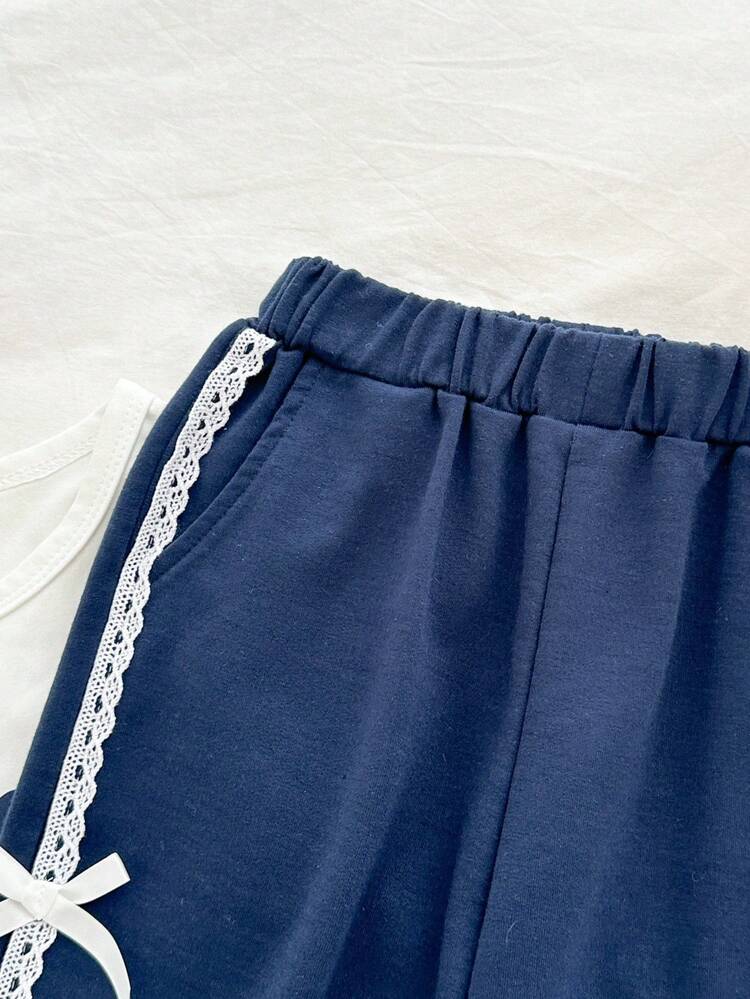 Genkimix Kids 2 件套女童（小童）圆领针织蝴蝶结印花白色长袖 T 恤上衣和荷叶边蝴蝶结海军蓝运动裤，秋季服装，适合外出、上学、日常穿着 - 彩色 - 查看 6