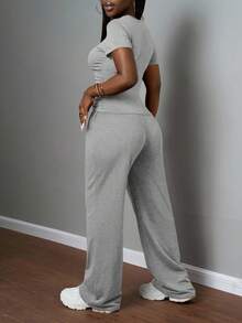 Slaydiva Bộ đồ nữ thường ngày màu trơn, cổ tròn, tay ngắn và quần ống đứng cạp chun, màu nâu, thích hợp cho mùa xuân hè, các lễ hội âm nhạc, lễ Phục Sinh, lễ Thánh Patrick. - Xám - Xem 2