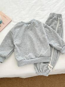 Genkimix Kids 2 Stücke Set für Kleine Mädchen bestehend aus Top mit Schleifendruck und Skinny Hose mit Spitzenbesatz