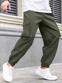 Manfinity Homme Pantalones cargo de unicolor talla grande para hombres con dobladillo con cordón y bolsillos, pantalones casuales largos lisos para salir, pantalones negros, regalo para esposo o novio, pantalones cargo negros, pantalones holgados negros para hombres, para otoño