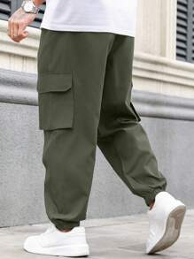 Manfinity Homme Pantalones cargo de unicolor talla grande para hombres con dobladillo con cordón y bolsillos, pantalones casuales largos lisos para salir, pantalones negros, regalo para esposo o novio, pantalones cargo negros, pantalones holgados negros para hombres, para otoño