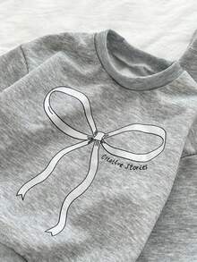 Genkimix Kids 2 Stücke Set für Kleine Mädchen bestehend aus Top mit Schleifendruck und Skinny Hose mit Spitzenbesatz