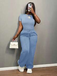 Slaydiva Bộ đồ nữ thường ngày màu trơn, cổ tròn, tay ngắn và quần ống đứng cạp chun, màu nâu, thích hợp cho mùa xuân hè, các lễ hội âm nhạc, lễ Phục Sinh, lễ Thánh Patrick. - Màu xanh lam - Xem 8