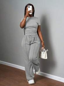 Slaydiva Bộ đồ nữ thường ngày màu trơn, cổ tròn, tay ngắn và quần ống đứng cạp chun, màu nâu, thích hợp cho mùa xuân hè, các lễ hội âm nhạc, lễ Phục Sinh, lễ Thánh Patrick. - Xám - Xem 4