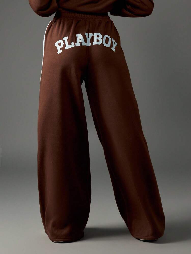Missguided x Playboy Jogginghose mit weitem Bein und seitlichen Streifen