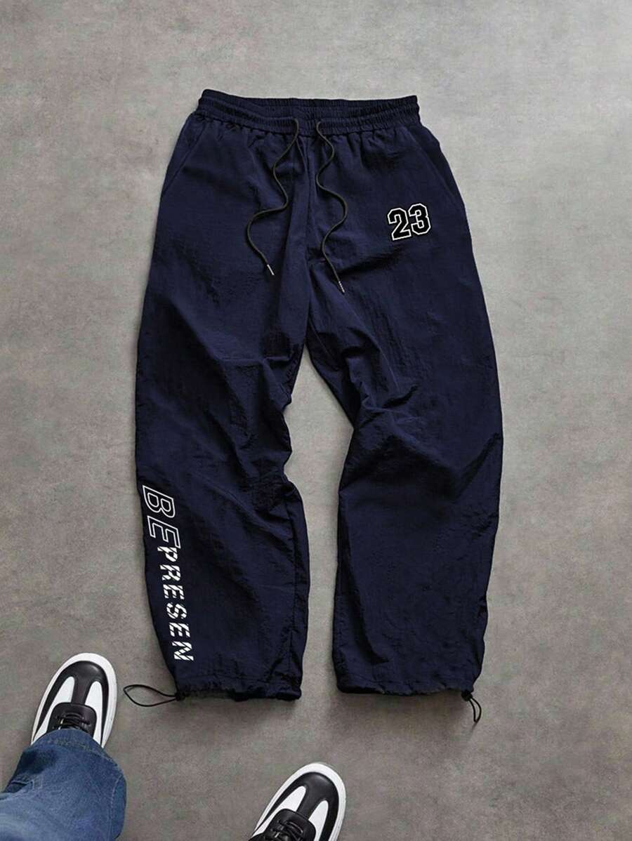 Manfinity Sport Corelite 男士字母印花抽绳腰宽松休闲运动裤健身服跑步裤，男士慢跑裤，男士健身裤，男士运动裤，运动裤，宽松健身服秋季透气运动裤 - 寶藍色 - 查看 1