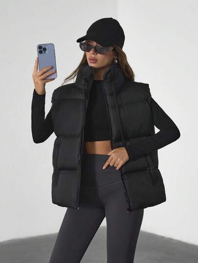 EURMUSE Black Hooded Puffer Vest: Relaxed Fit, Great For Layering On Cold City Walks Or Weekend Getaways, Made From Water-Repellent Quilted Polyester Fabric With Thick Padding And A Drawstring Hood For Maximum Warmth And Comfort Black Vest Women Womens Puffer Vest Winter Vest Women Black Puffer Vest Women Vests Outerwear Women Winter Clothes For Women