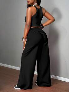 Slaydiva 2 件套女士休闲街头紧身吊带背心和宽松裤子套装，适合街头风格，黑色卡通人物和火焰印花，适合嘻哈 - 彩色 - 查看 2