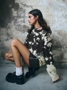 TypaGal The Distressed Knit Sweater Blends Goth And Alternative Style Into Fall Clothes, Winter Wear, And Halloween Costumes. Its Rugged Pattern Gives Character To Autumn Looks And Casual Layering. - Coffee Brown - View 1