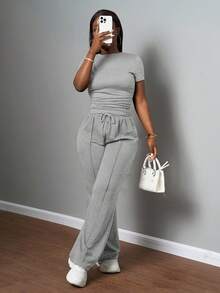 Slaydiva Bộ đồ nữ thường ngày màu trơn, cổ tròn, tay ngắn và quần ống đứng cạp chun, màu nâu, thích hợp cho mùa xuân hè, các lễ hội âm nhạc, lễ Phục Sinh, lễ Thánh Patrick. - Xám - Xem 6