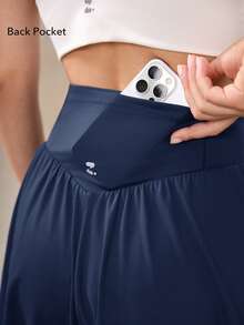 OutZeal Pantalones cortos deportivos para mujer con control de abdomen, absorción de sudor, cintura cruzada, con bolsillo incorporado, para tenis, gimnasio y entrenamiento - Azul - Ver 5