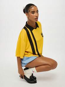 SUMWON WOMEN Boxy Varsity Style Collared Polo Top With Diagonal Stripe Detail And Number Print Half Sleeve Drop Shoulder Casual Preppy Oversize Tshirt - Yellow - View 4