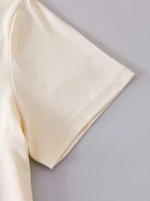 女孩休闲可爱卡通熊和字母图案印花短袖 T 恤和紧身裤两件套，适合返校装