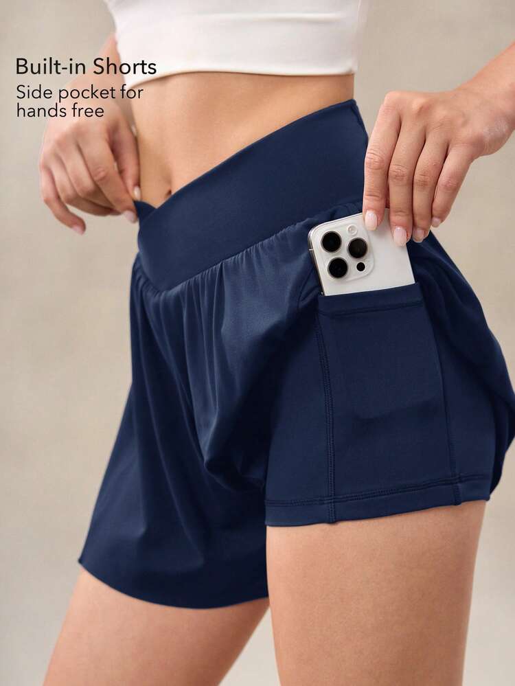 OutZeal Quần short thể thao cạp chéo, co giãn, thấm mồ hôi, kiểm soát bụng dành cho nữ, dùng khi tập gym, tennis - Màu xanh lam - Xem 2