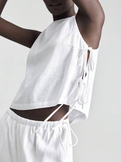 Ontre 2026 New Linen Blend Sleeveless Blouse With Side Slit & Bow Accent, Comfortable Casual Style For Music Festivals, Concerts, Country Music Events, Women's Summer Tops, Beach/Vacation Bohemian Chic Outfits Modern Urban Casual Fashion Business Casual Women's Office Wear Low-Key Old Money Style Effortless Temperament High-End Urban Commuting High-Quality Airport Women's Wear High-End Material Old-Fashioned Cruise Attire For Wedding Guests Beach Clothing, Bohemian Style