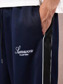 SUMWON 阔腿运动裤街头休闲侧条纹宽松抽绳腰部舒适下装日常弹力踝部秋冬经典款式 - 藏蓝色 - 查看 5