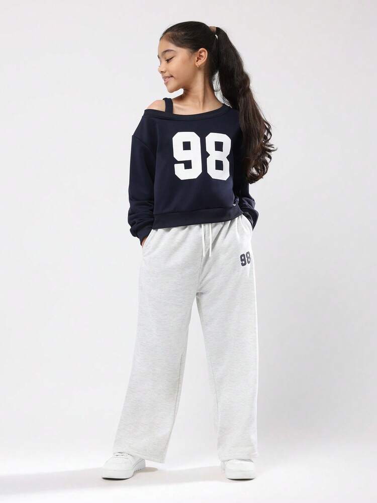 Bluza z odkrytymi ramionami i szerokimi nogawkami