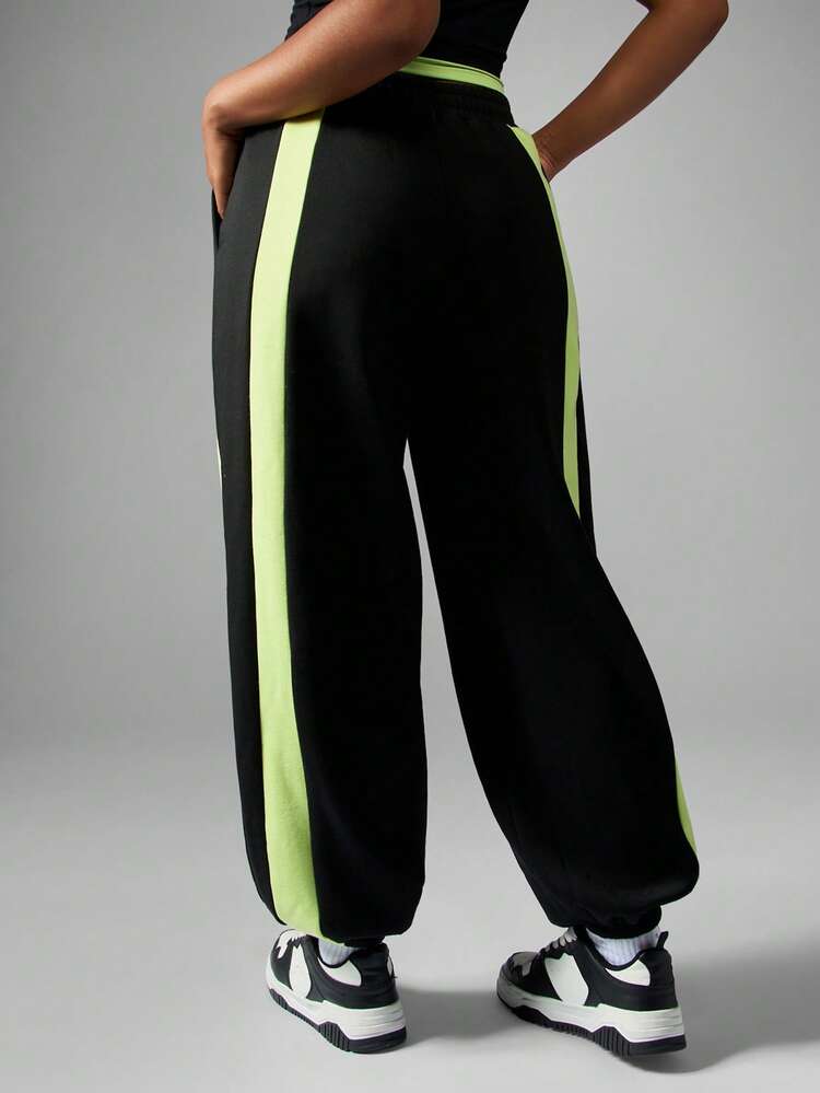 Missguided x Playboy Pantalon de jogging ample style Y2K avec rayures latérales fluo, taille haute, mode de rue décontractée, streetwear ample et lâche, mode automne-hiver