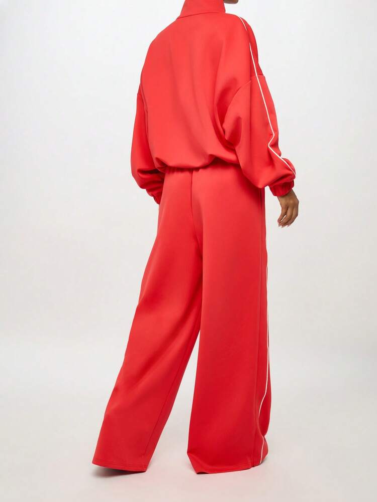 SUMWON WOMEN Pantalones deportivos de pierna ancha con insignias universitarias y ribetes