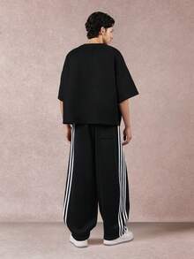 SUMWON 高级舒适抽绳运动裤，阔腿复古运动风侧条纹休闲家居服街头时尚运动休闲秋冬裤装纯色 - 黑色 - 查看 4